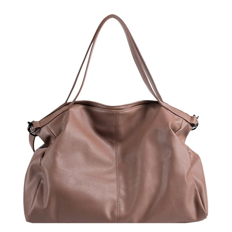 Large soft-surface PU messenger tote bag in a choice of colours, showing internal pockets and adjustable shoulder strap.