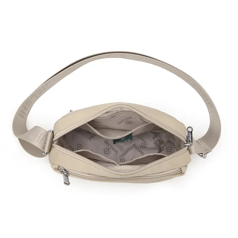Women's soft nylon multi compartment shoulder bag in urban simplicity style, horizontal square shape, available in multiple colours