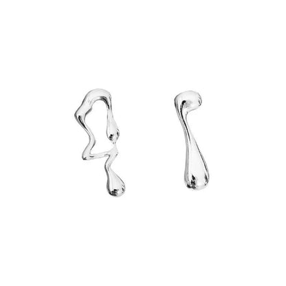 Asymmetric lava earrings with silver needle geometry, lightweight and stylish