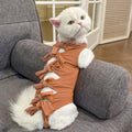 Adjustable lace-up polyester recovery suit for a cat after spaying surgery, shown in blue.