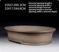 Handmade antique oval purple sand clay bonsai pot showing shallow 25cm length and 21cm width.