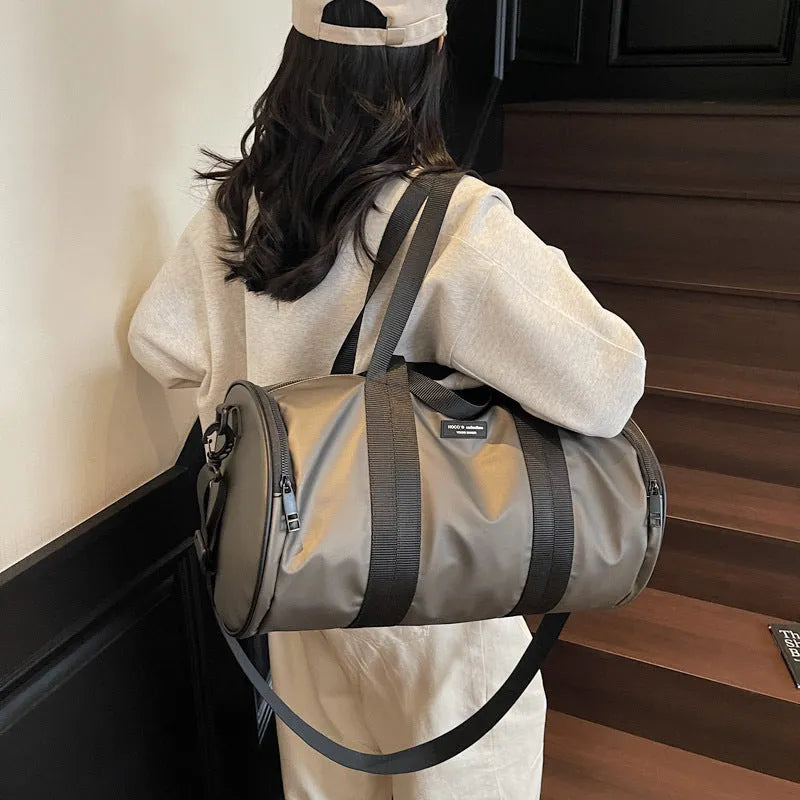 Oxford cloth waterproof sports handbag in black, dark gold or dark grey colours