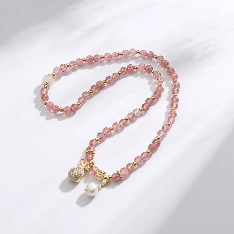 Women's geometric strawberry quartz crystal bracelet for money drawing