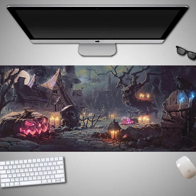 Oversized Halloween themed gaming mouse pad with non-slip rubber cloth base on a desk