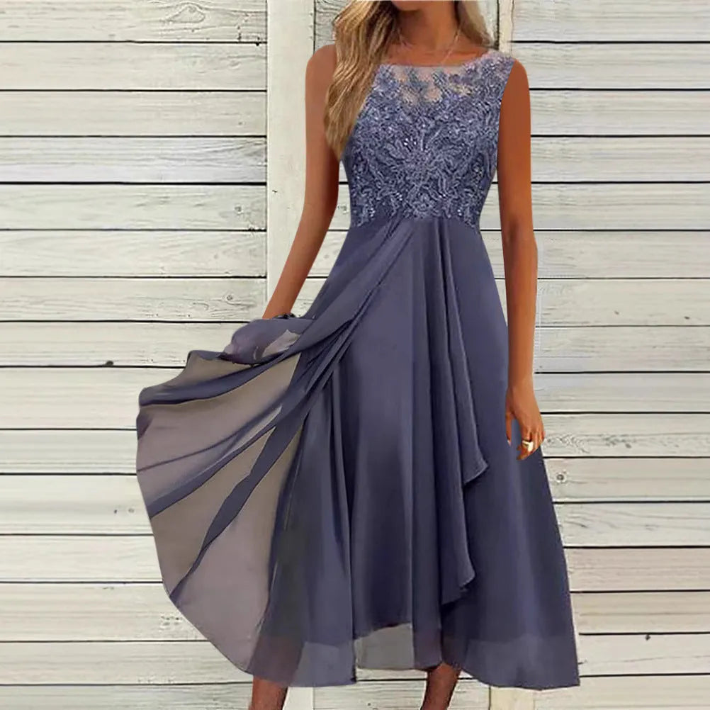 Women's sleeveless green chiffon dress with lace hollow-out stitching detail, midi length.