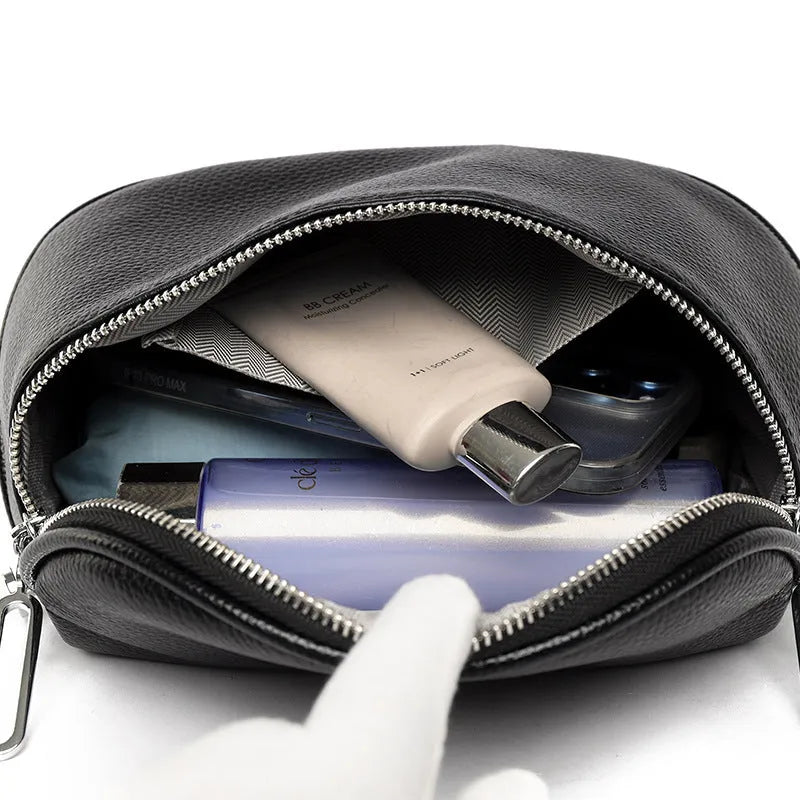 Women's saddle-shaped PU leather messenger bag with single shoulder strap in black, white, or green colour options