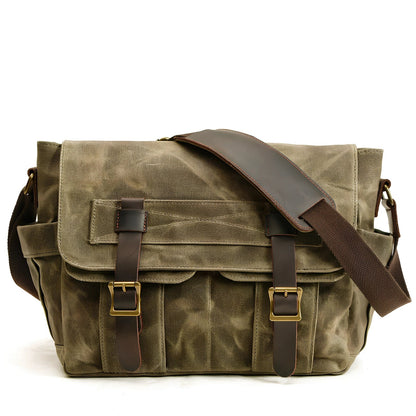 Retro men's canvas shoulder messenger bag in black, waterproof with internal pockets for laptop and phone, medium square size