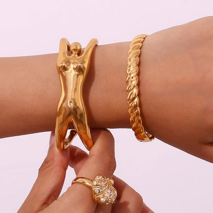 Gold plated stainless steel bracelet with creative female body design