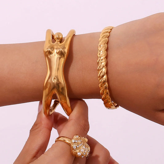 Gold plated stainless steel bracelet with creative female body design