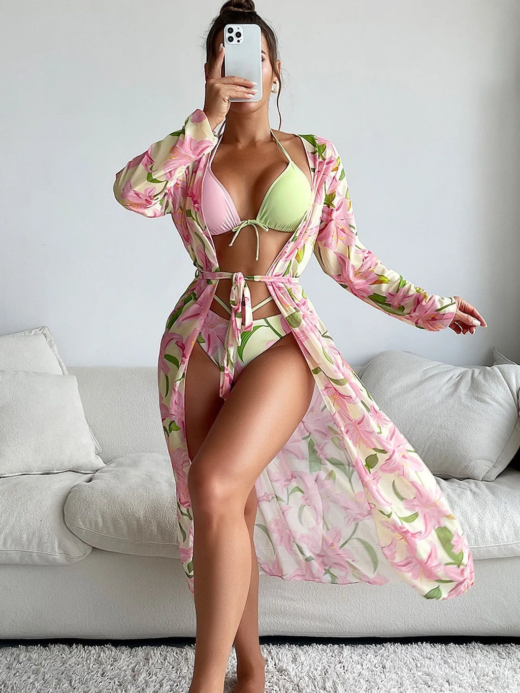 Women's printed bikini swimsuit top and bottom set on a neutral background.