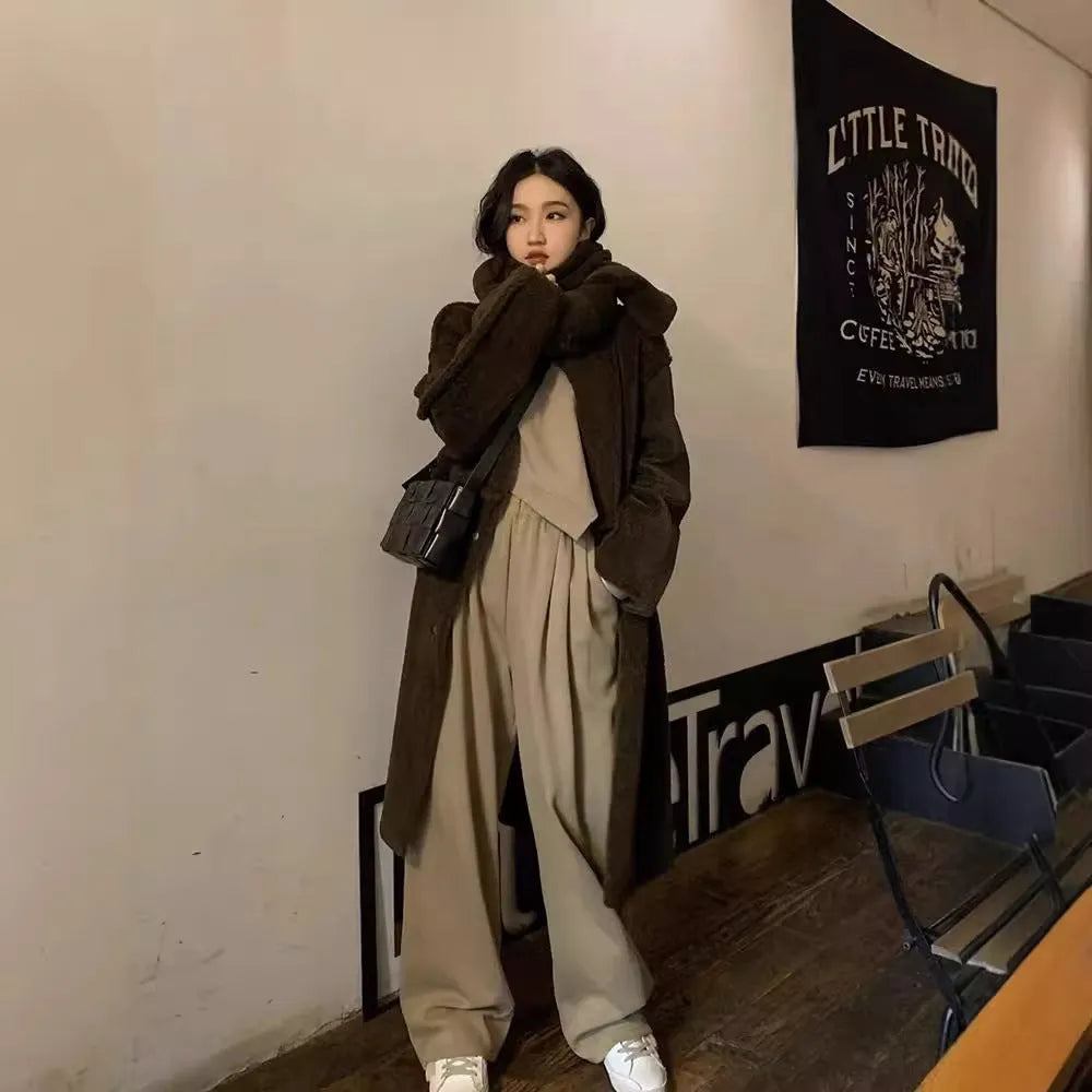 Women's khaki brown loose fit casual sports suit two-piece set with long sleeves and trousers.