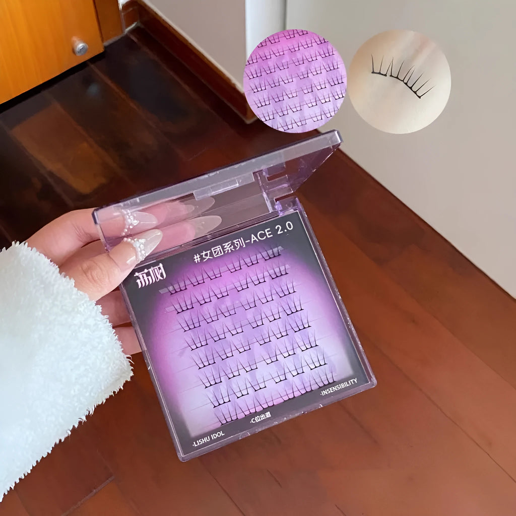 Reusable false eyelash stickers with 48 artificial fibre clusters including glue and tweezers