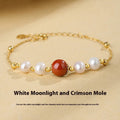 Yellow retro-style cinnabar bracelet for women made from 925 silver on a neutral background.