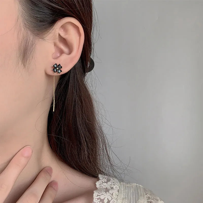 Copper clover leaf hanging earrings for women, A203 style, leaf shape on white background
