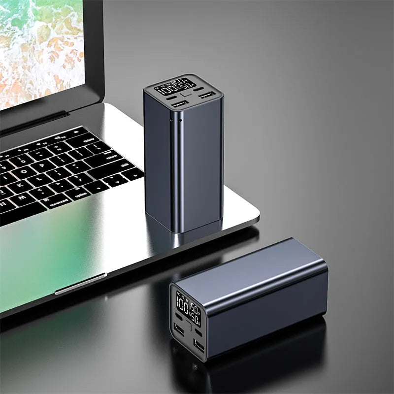 Black high‑power 65W 20000mAh metal laptop charging bank showing its size and ports.