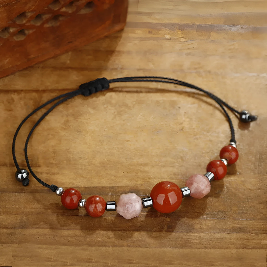 Red manual beaded bracelet with sunstone, redstone and copper geometric beads