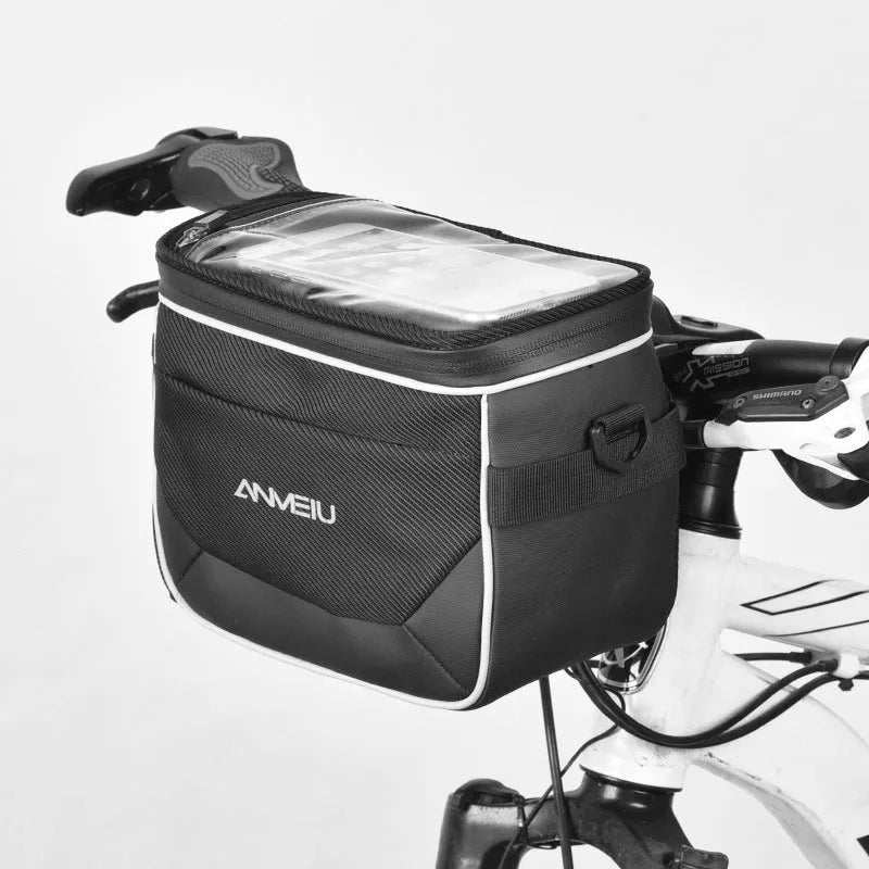 Black 7-inch polyester bicycle handlebar bag mounted on bike, showing compact folding design.