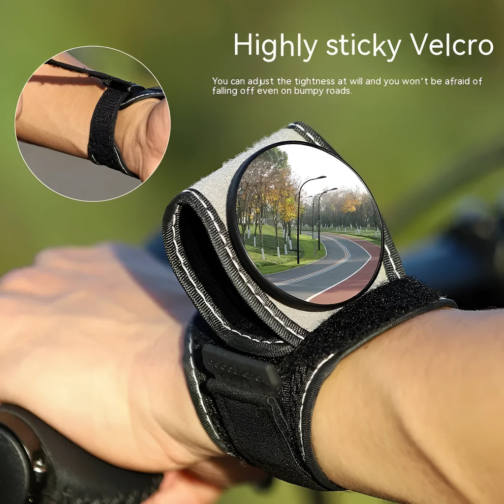 Black nylon bicycle rear-view mirror showing wrist mounting and adjustable viewing mechanism