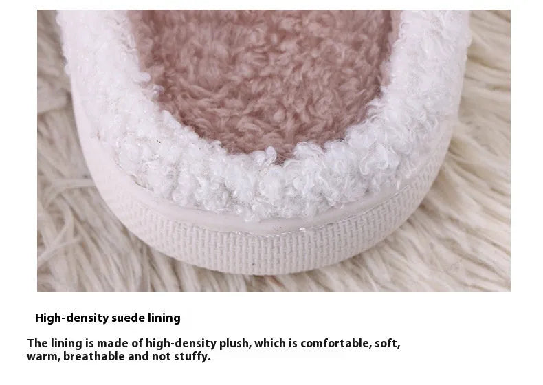 White cartoon pattern fluffy slippers with a plush upper and a non-slip rubber sole.