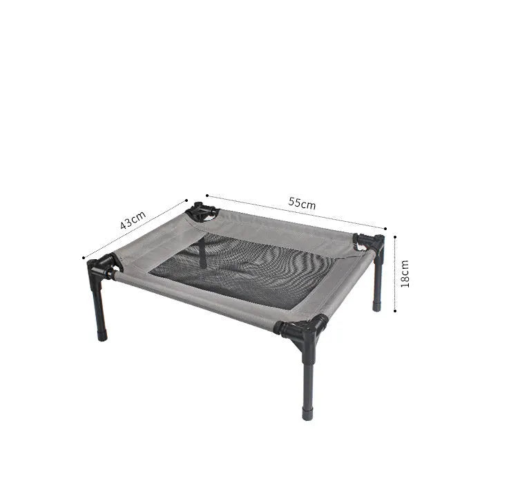 Black portable outdoor dog bed with steel frame and removable Oxford cloth cover, shown on grass.