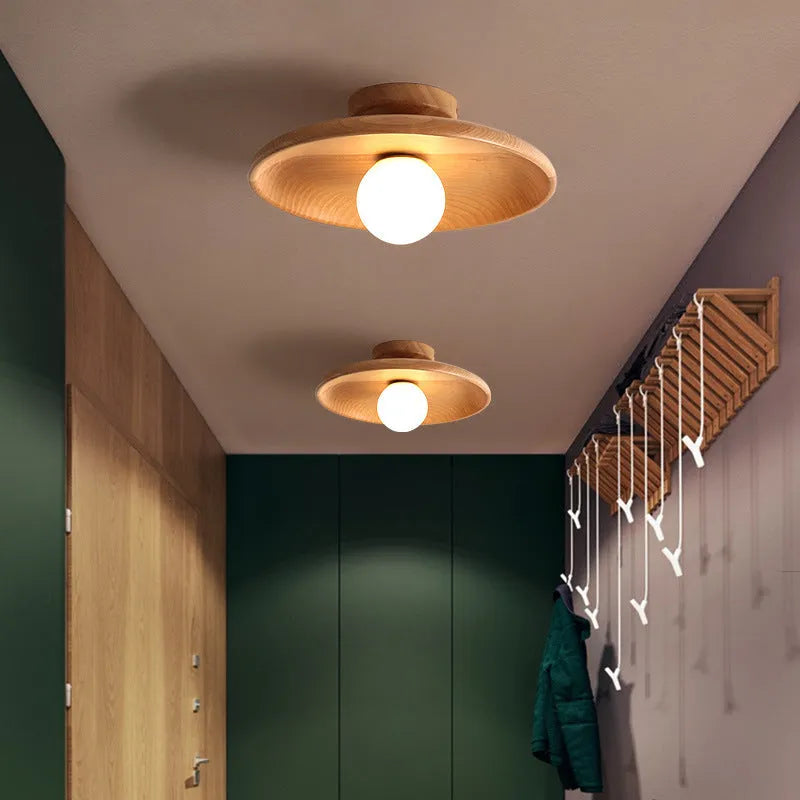 Solid wood ceiling lamp with glass shade in minimalist circular design