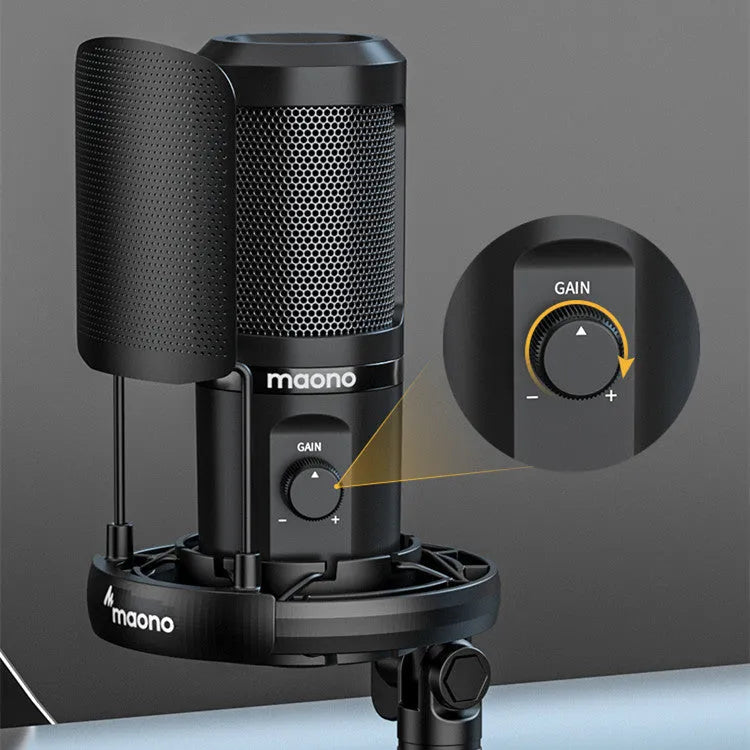 USB condenser microphone on a tripod with shock mount and data cable for computer and mobile recording