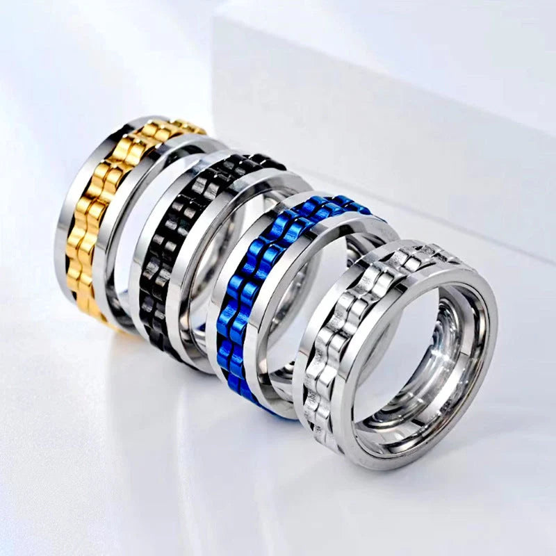 Men's titanium spinner ring with square texture and rotating gear design