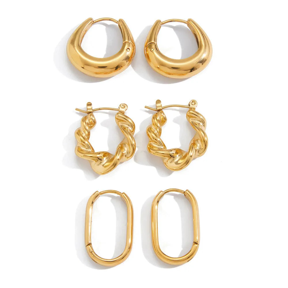 18K gold titanium steel geometric ellipse ear clip for women, light luxury style, on a model