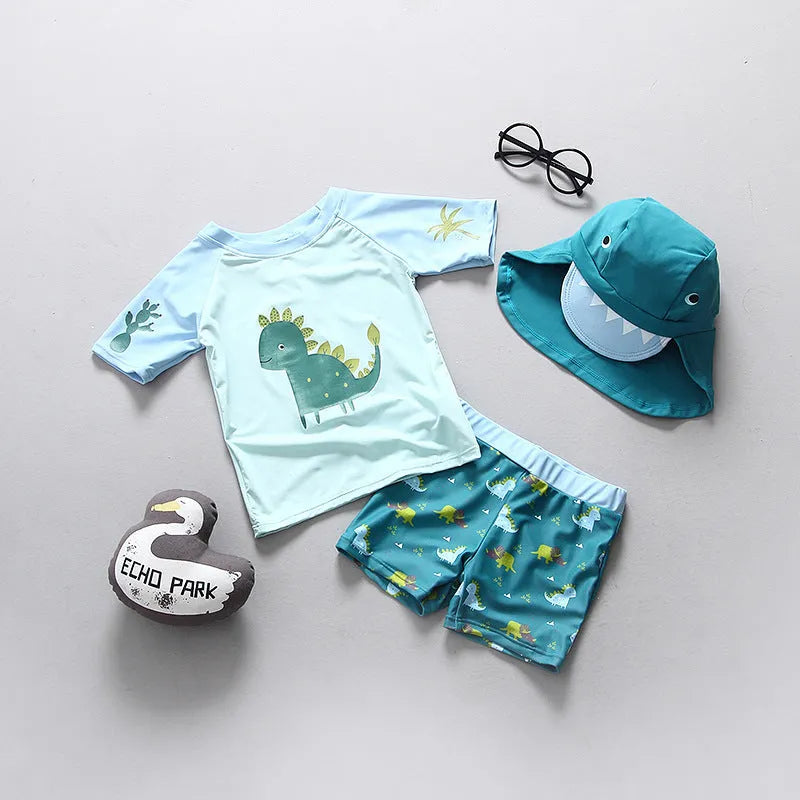 Light green dinosaur print children's nylon swimsuit with matching sun hat for boys