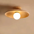 Solid wood ceiling lamp with glass shade in minimalist circular design