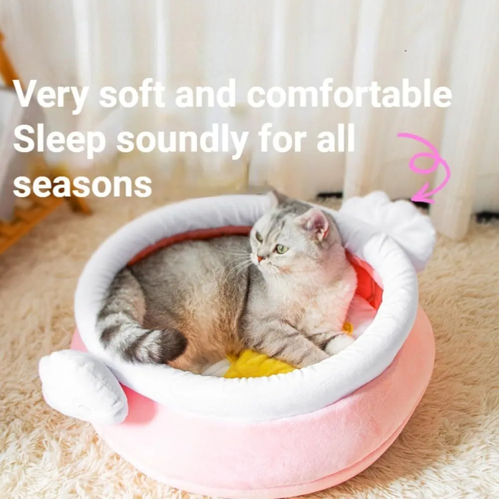Pink honey pot-shaped cat sofa bed with a magic wand, showing a removable cushion inside.