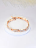 Geometric rose gold opal bracelet for women with quadrilateral alloy frame and gemstone inlay