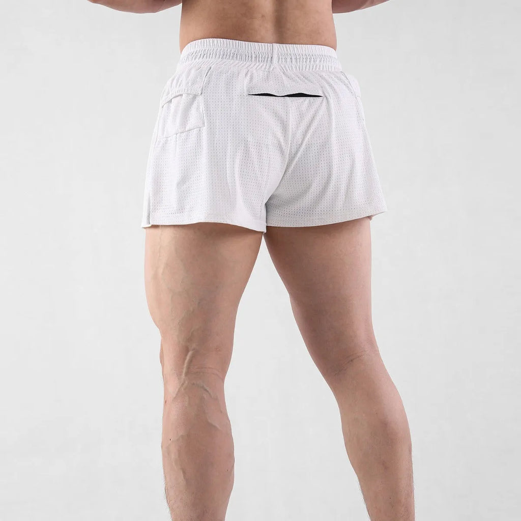 Men's black nylon quick-dry summer shorts laid flat, showing mid-waist and shorts length.