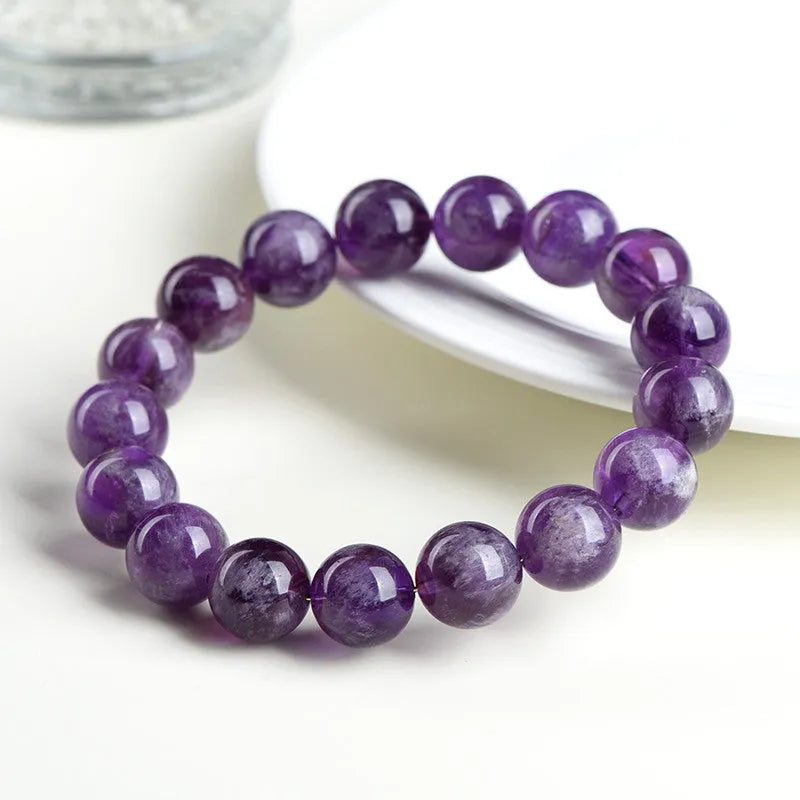 Natural feather amethyst crystal bracelet with Snow Mountain purple scattered beads and Ruyi design.