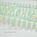 Electroplated cat's eye artificial gel nails in short ladder XS, S, and M sizes showing aurora and solid colour styles.