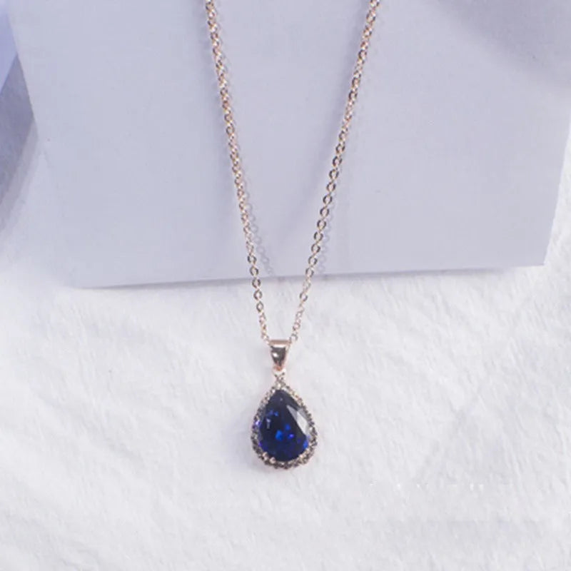 Women's alloy drop necklace with geometric rhinestone pattern in pink rose gold colour
