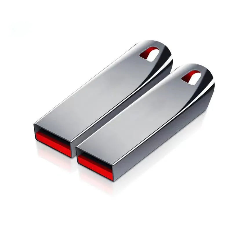 Silver metal USB flash drive with a USB 2.0 connector showing large capacity up to 2TB.