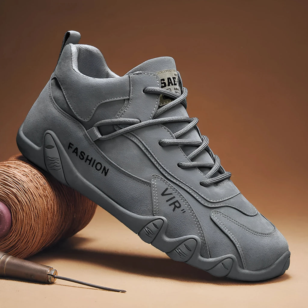 Men's grey low-cut casual shoes with elastic band and synthetic leather upper.
