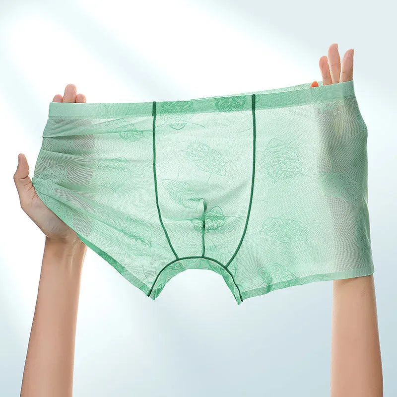Men's ice silk seamless boxers in mint green – lightweight transparent nylon underwear with mid waist design on white background