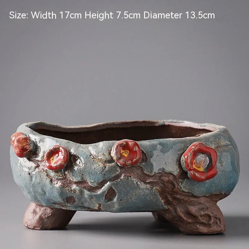 Hand-painted ceramic flower pot with pastoral design and large planting area