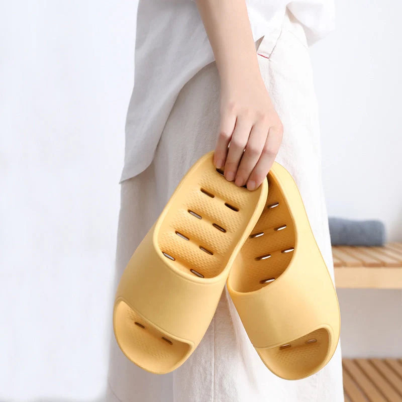 Thick-soled EVA slippers in various colours for home and bathroom use