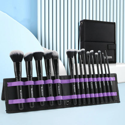 Black 15-piece makeup brush set with wooden handles and folding cloth storage bag