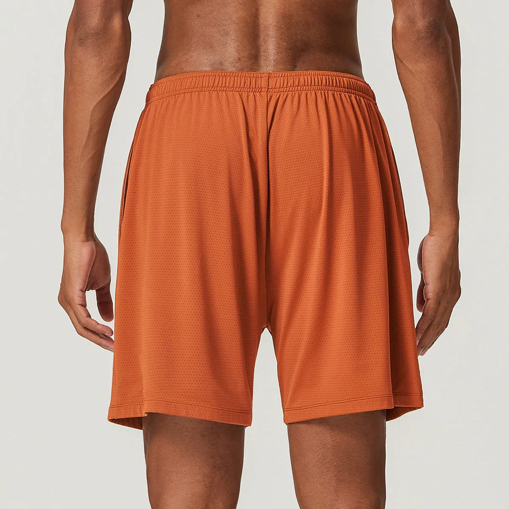 Men's quick-drying double-layer running shorts in sky green colour, laid flat to show mid-waist fit and shorts length.