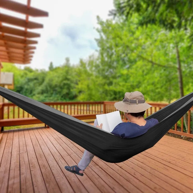 Double parachute hammock 210T nylon 300x200cm in black brown with tree straps on outdoor trees