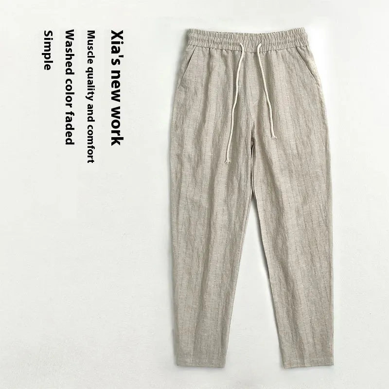 Men's thin cotton linen casual trousers in a cropped length, shown in a striped pattern.