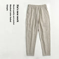 Men's thin cotton linen casual trousers in a cropped length, shown in a striped pattern.