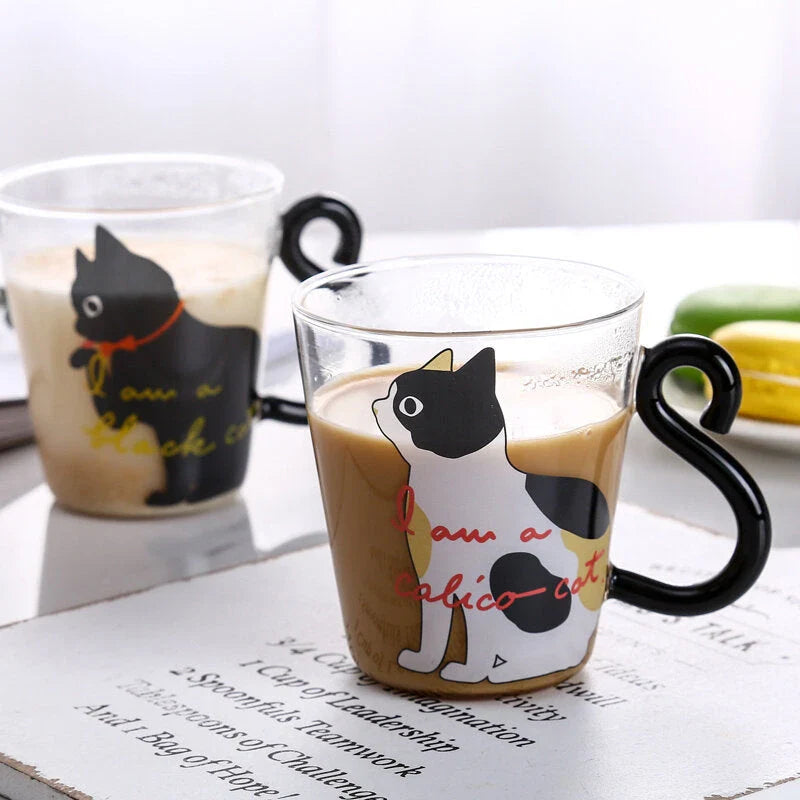 Adorable cat-themed glass mug with tail-shaped handle, perfect for hot and cold beverages