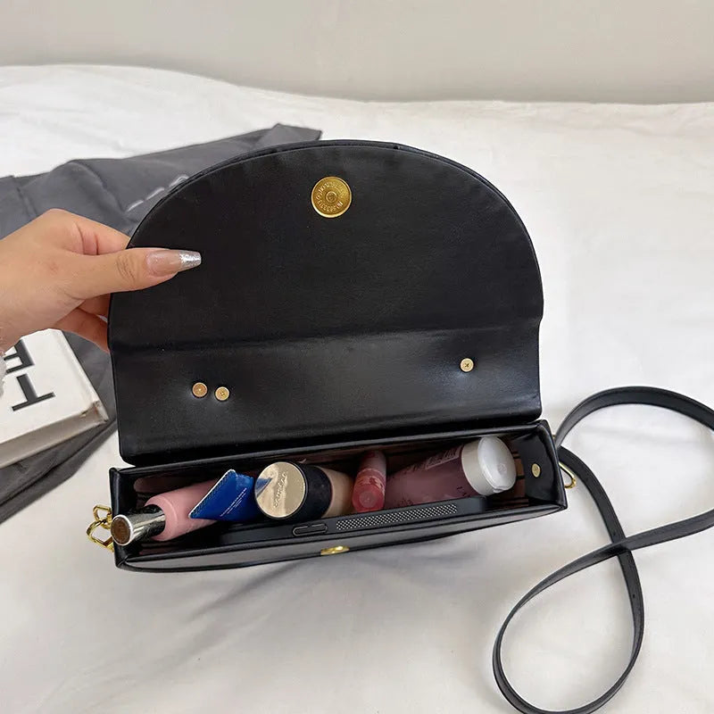 Solid colour PU oval saddle bag with zipper interior in khaki