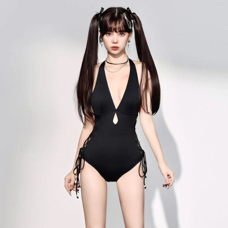 Black women's one-piece swimsuit with V-neck design and hollow straps, polypropylene fibre fabric