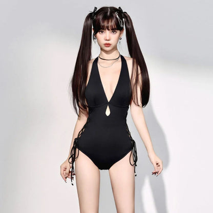 Black women's one-piece swimsuit with V-neck design and hollow straps, polypropylene fibre fabric